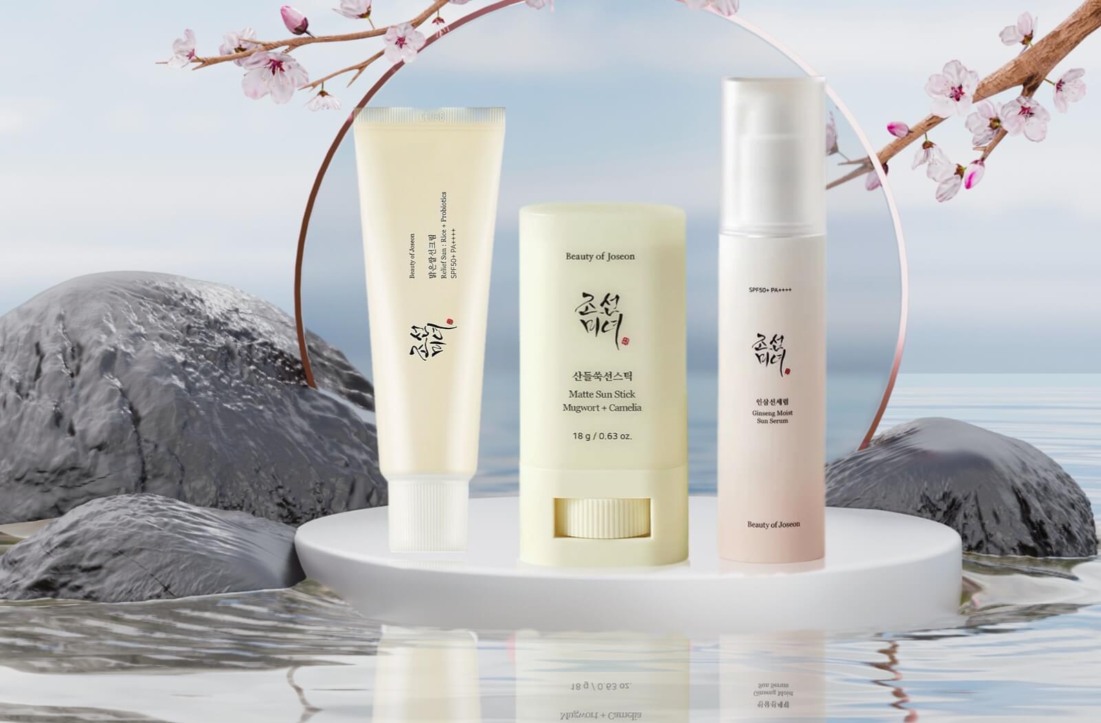 3 beauty of joseon sunscreens floating on water - links to beauty of joseon sun serum and link to their collection