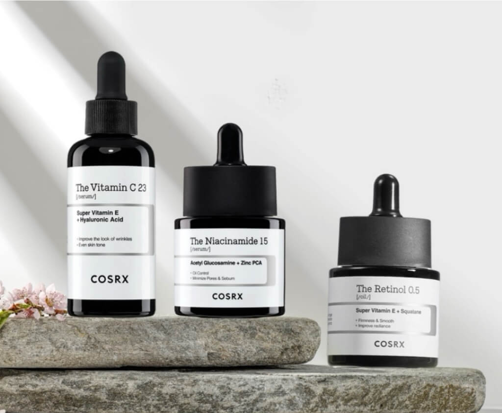 3 bottles of cosrx the derm serums with link to the product and link to the brand
