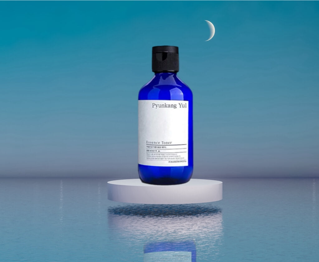 Bottle of Essence toner floating on moonlight sea - links to essence toner