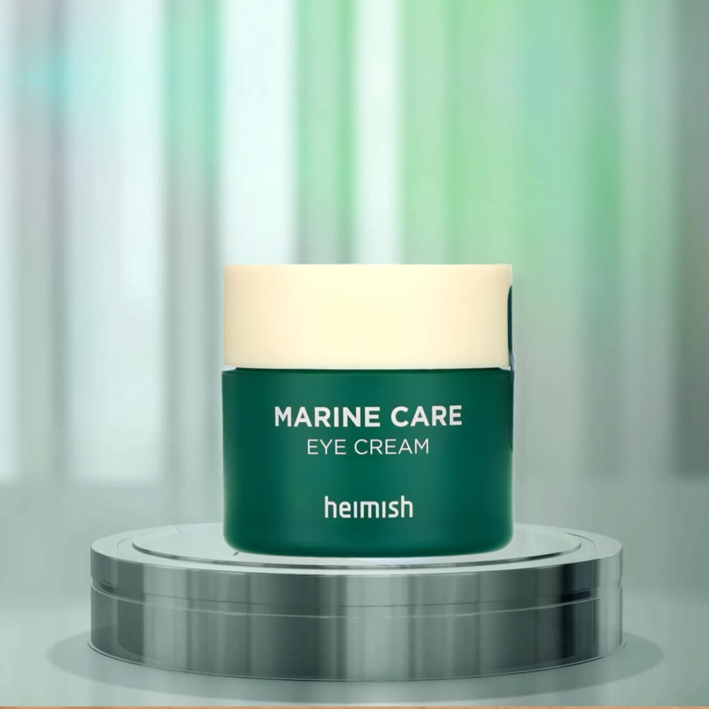 Jar of marine care eye cream sitting on matching green stand - links to heimish eye cream